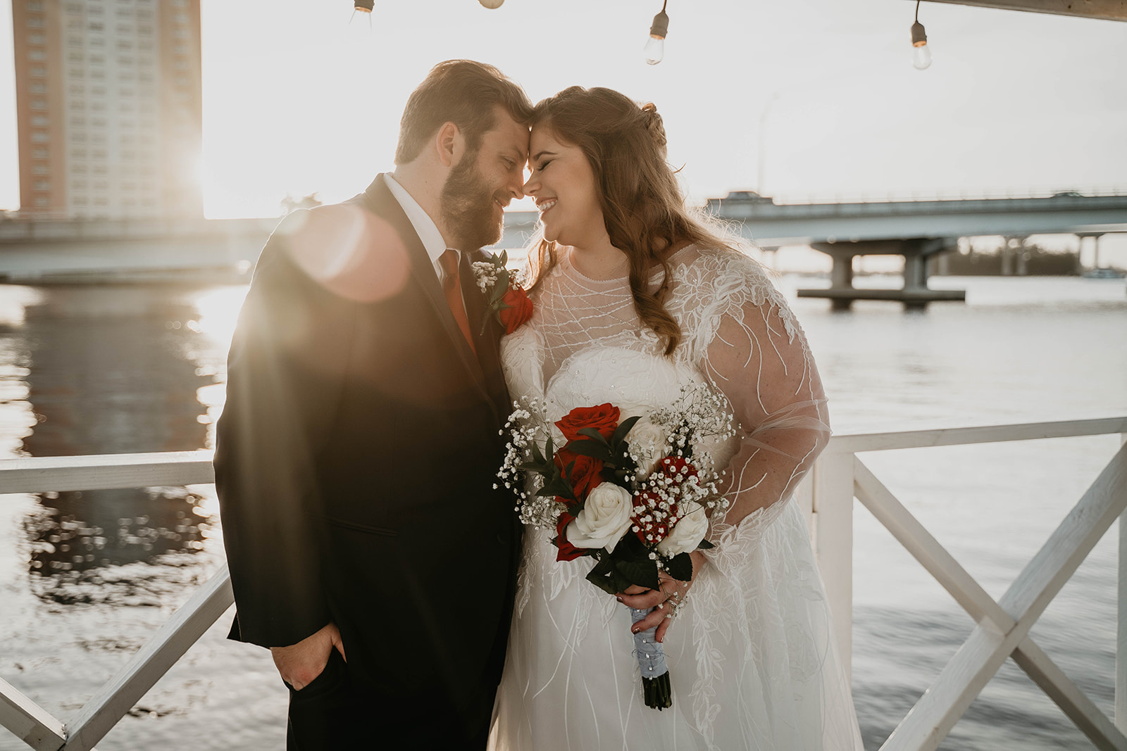 Bride and Groom Waterfront Wedding Portraits at the Heitman House