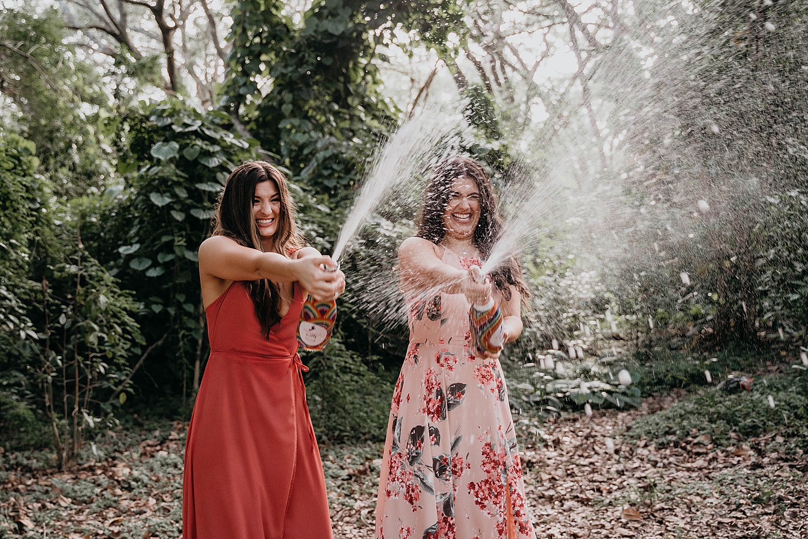 Whimsical LGBTQ Engagement in Tree Tops Park Captured by West Palm Beach Engagement Photographer, Krystal Capone Photography.