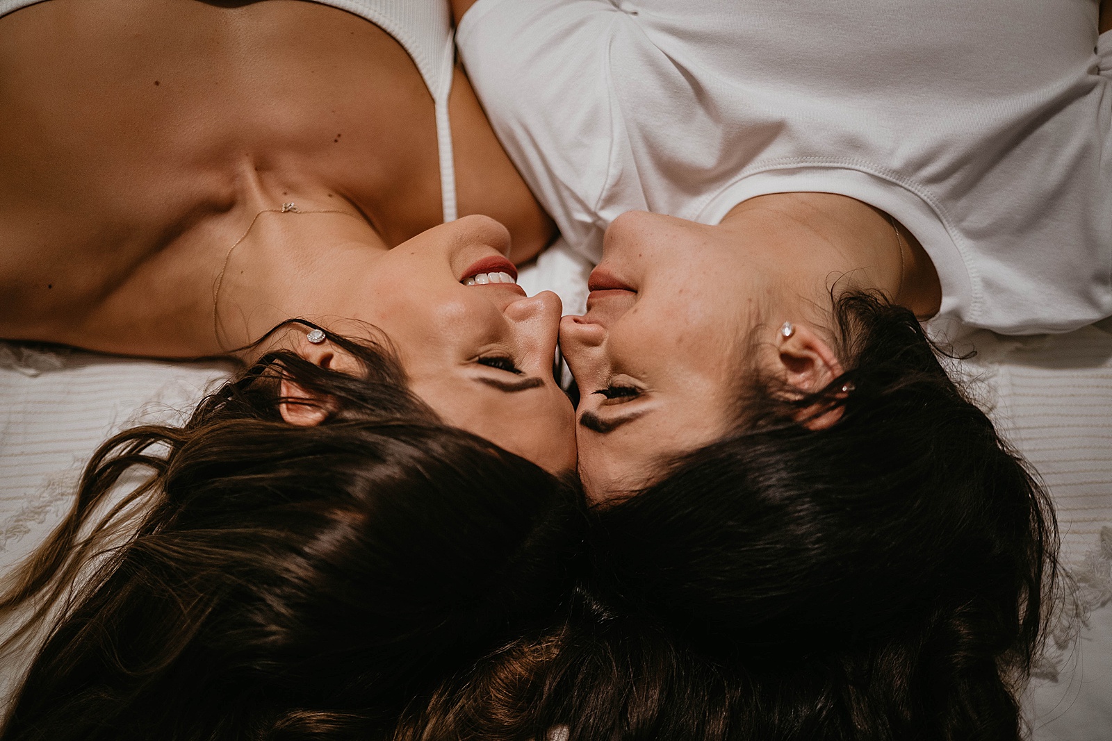 Cozy LGBTQ Engagement in home session Captured by West Palm Beach Engagement Photographer, Krystal Capone Photography.