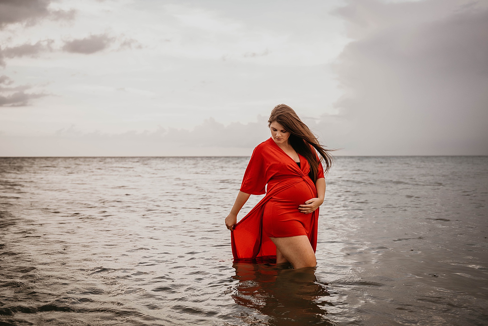 Empowering Palm Beach Ocean Maternity Session captured by South Florida Lifestyle Photographer, Krystal Capone Photography