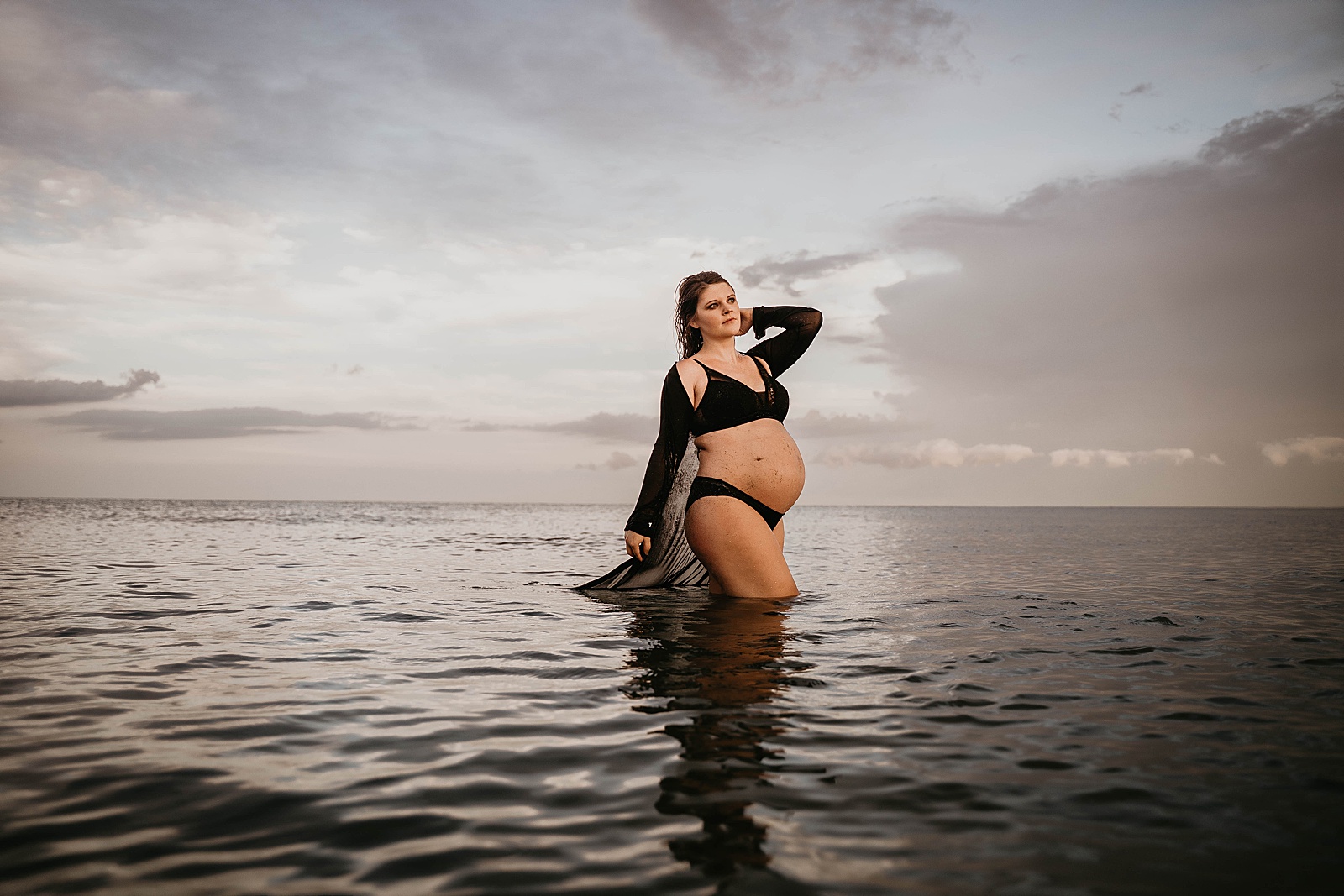 Empowering Palm Beach Ocean Maternity Session captured by South Florida Lifestyle Photographer, Krystal Capone Photography