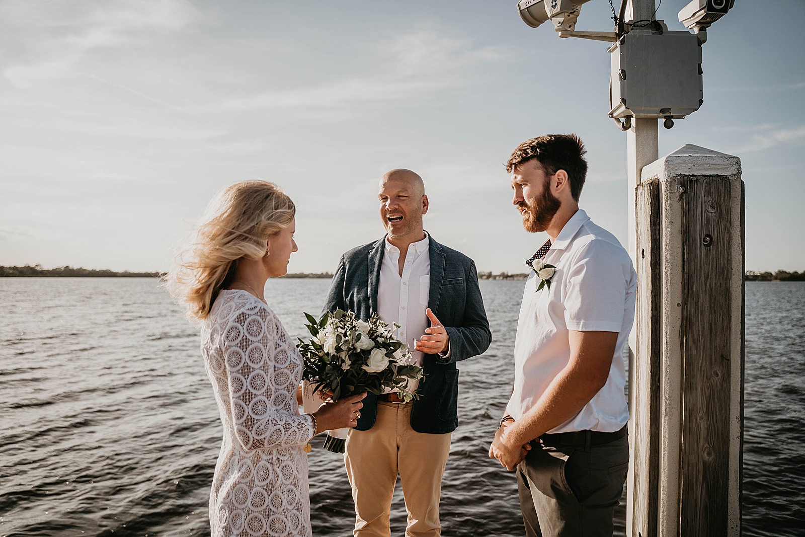 South Florida Waterfront Elopement ceremony vows captured by South Florida Elopement Photographer, Krystal Capone Photography