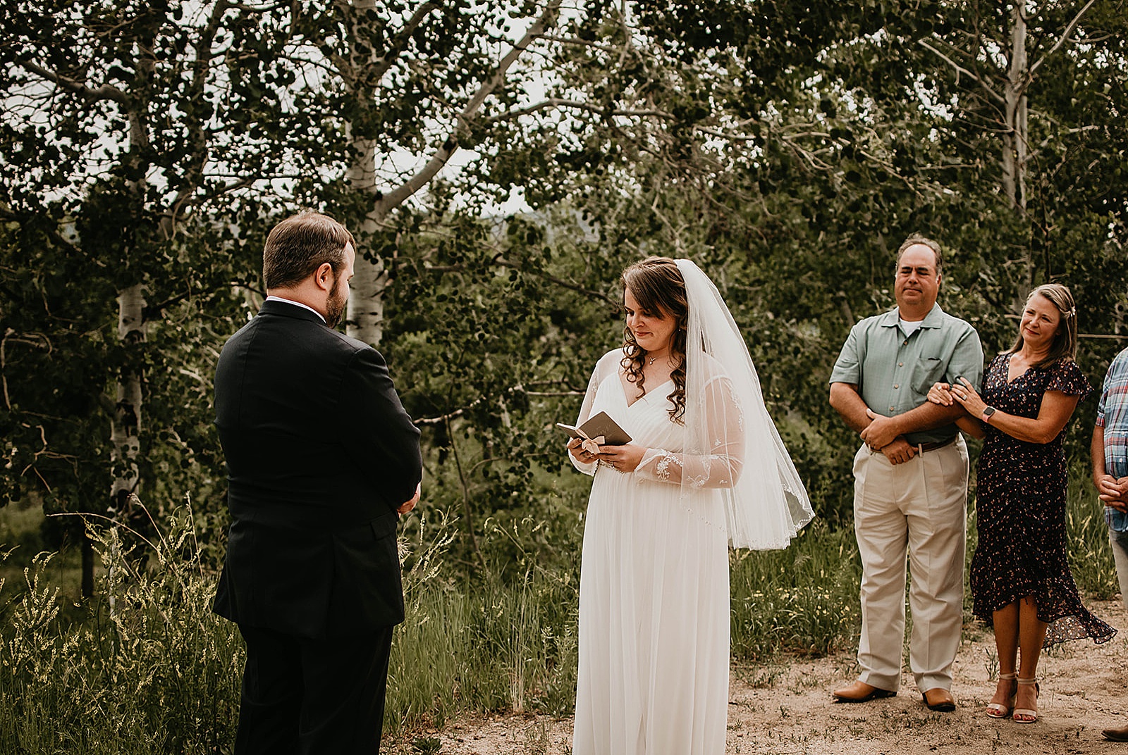 Rustic Colorado Elopement Ceremony by Krystal Capone Photography