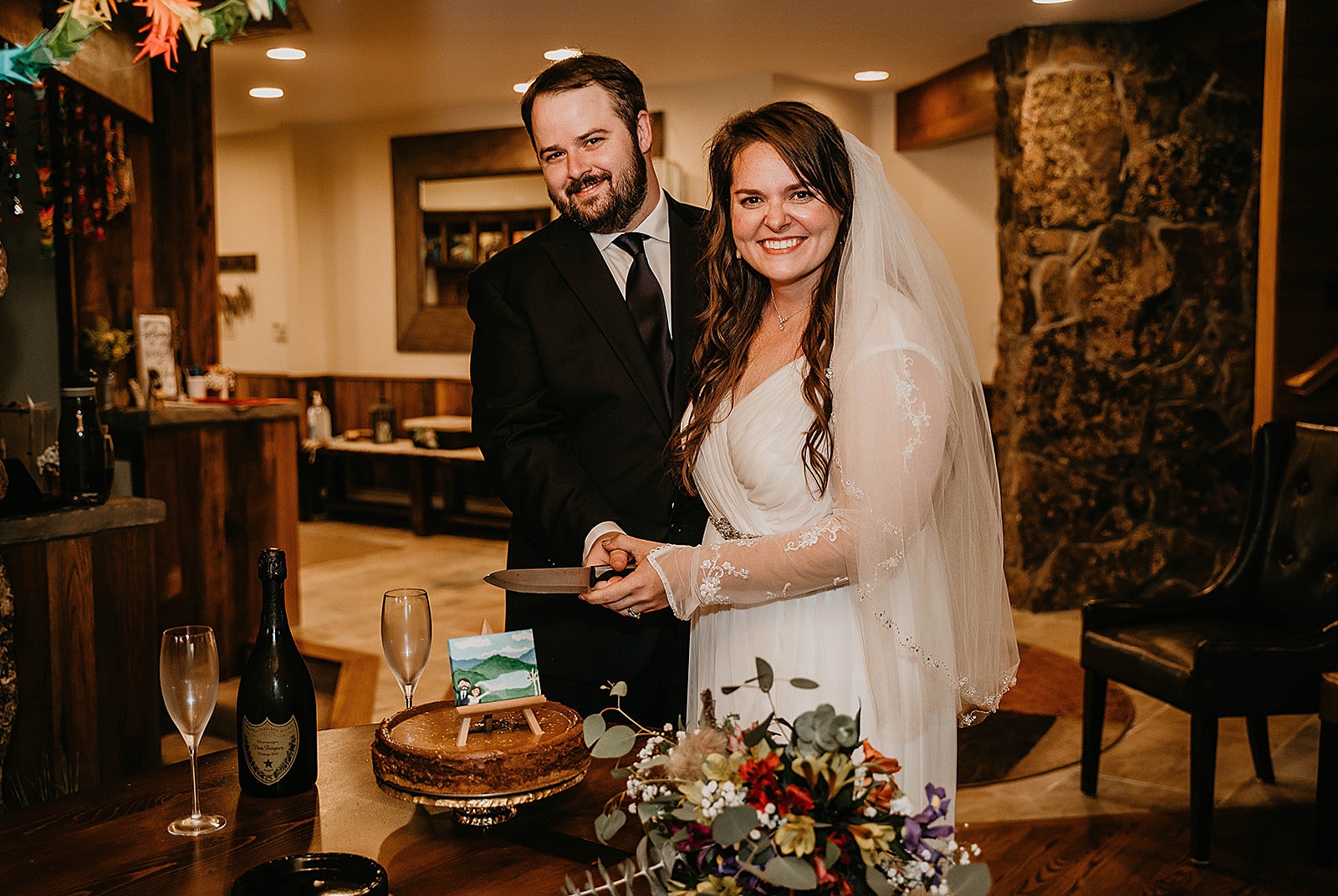 Rustic Colorado Elopement Reception Cake Cutting by Krystal Capone Photography