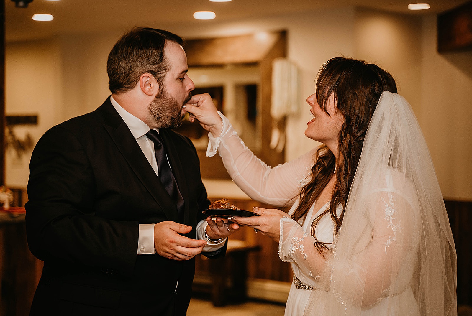 Rustic Colorado Elopement Reception Cake Cutting by Krystal Capone Photography