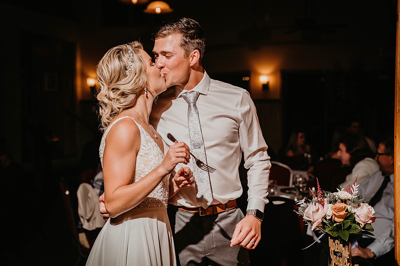 Bride and Groom kissing after cake cutting The Estate on the Halifax Wedding Photography captured by South Florida Wedding Photographer Krystal Capone Photography 