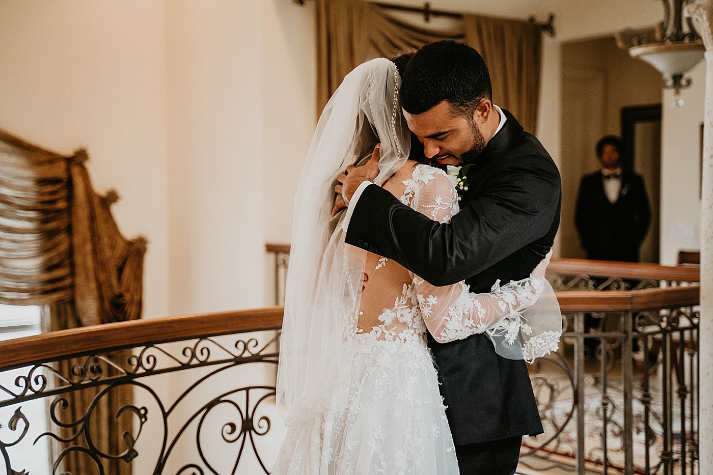 Bride and Groom hugging emotionally first look Intimate Home Wedding captured by South Florida Wedding Photographer Krystal Capone Photography