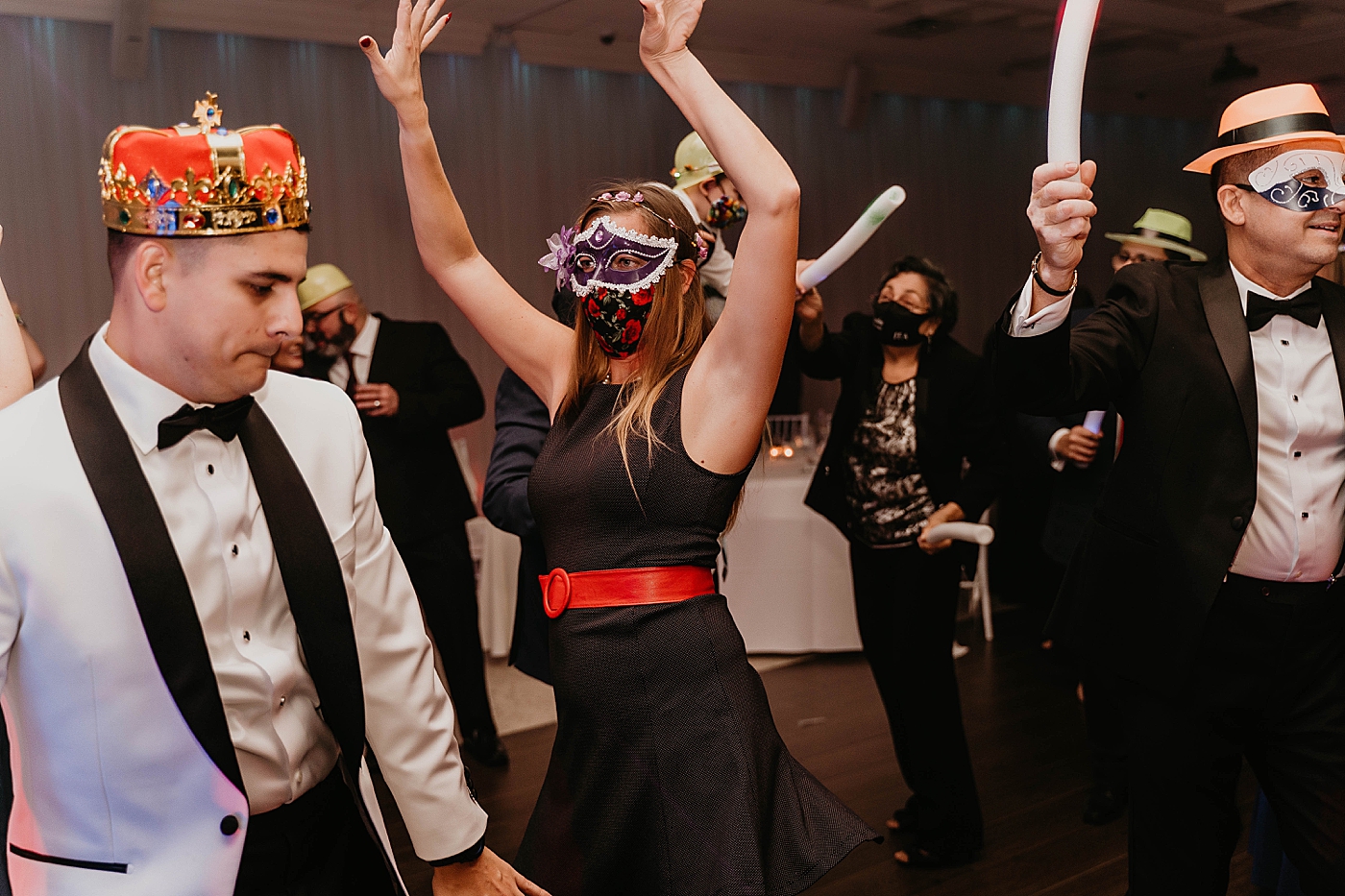 Reception mask on dancing Lavan Venue Wedding Photography captured by South Florida Wedding Photographer Krystal Capone Photography