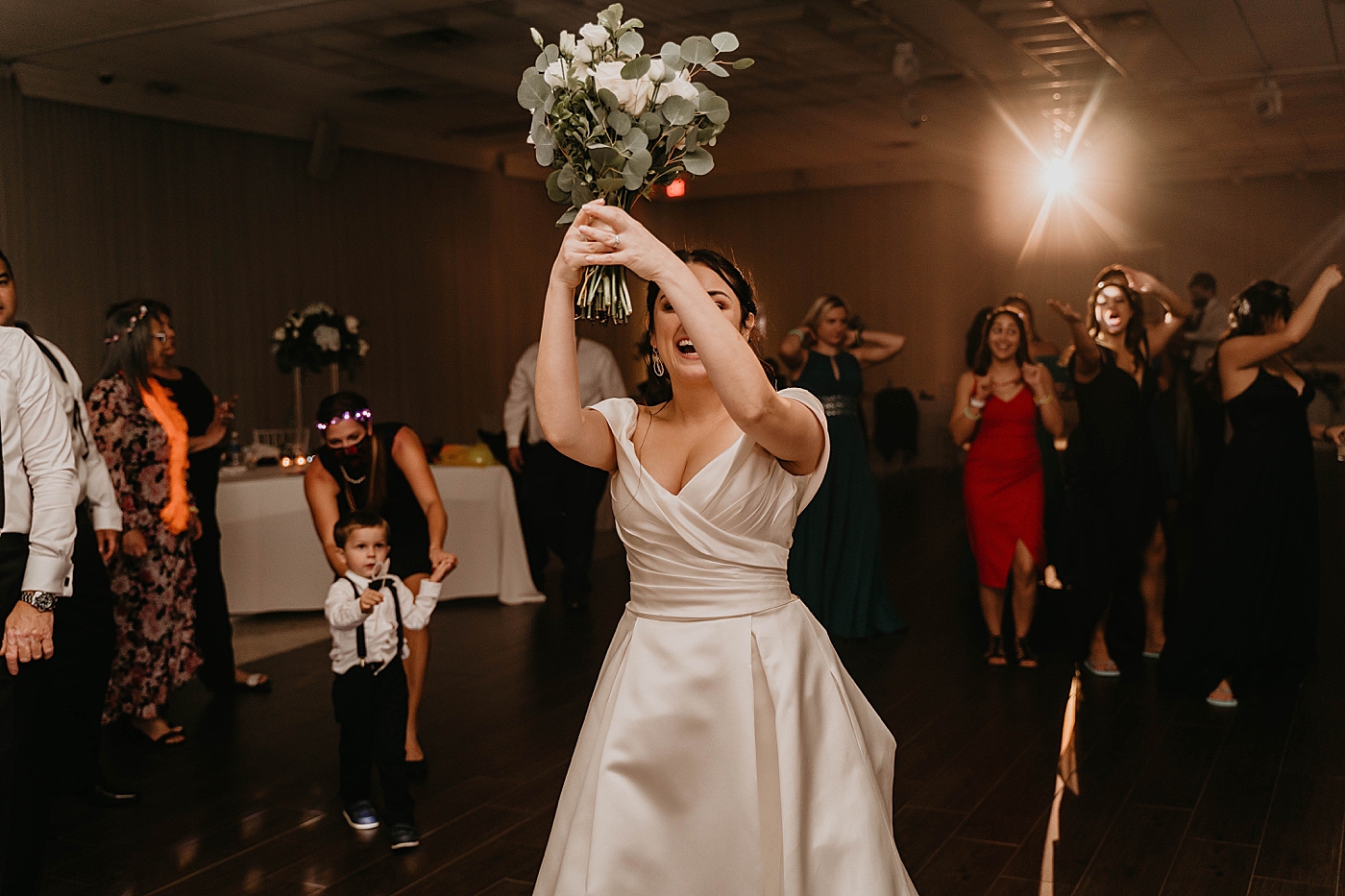 Bouquet Toss Reception Lavan Venue Wedding Photography captured by South Florida Wedding Photographer Krystal Capone Photography
