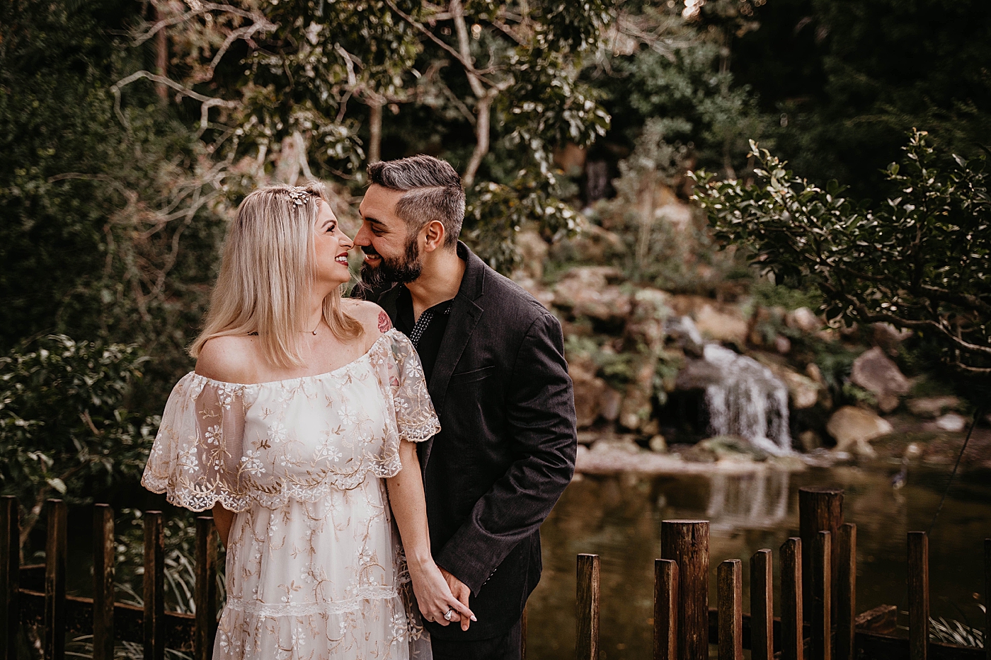 Couple looking into each other's eyes Morikami Museum and Japanese Gardens Engagement Photography captured by Krystal Capone Photography