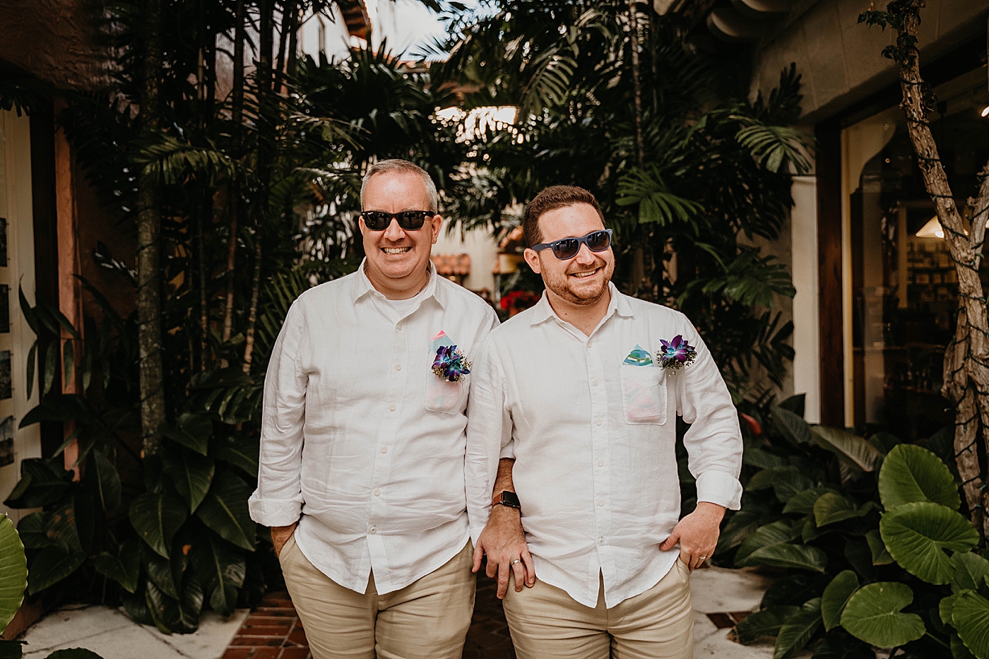 Couple entering with sunglasses Palm Beach Elopement Photography captured by South Florida Photographer Krystal Capone Photography 