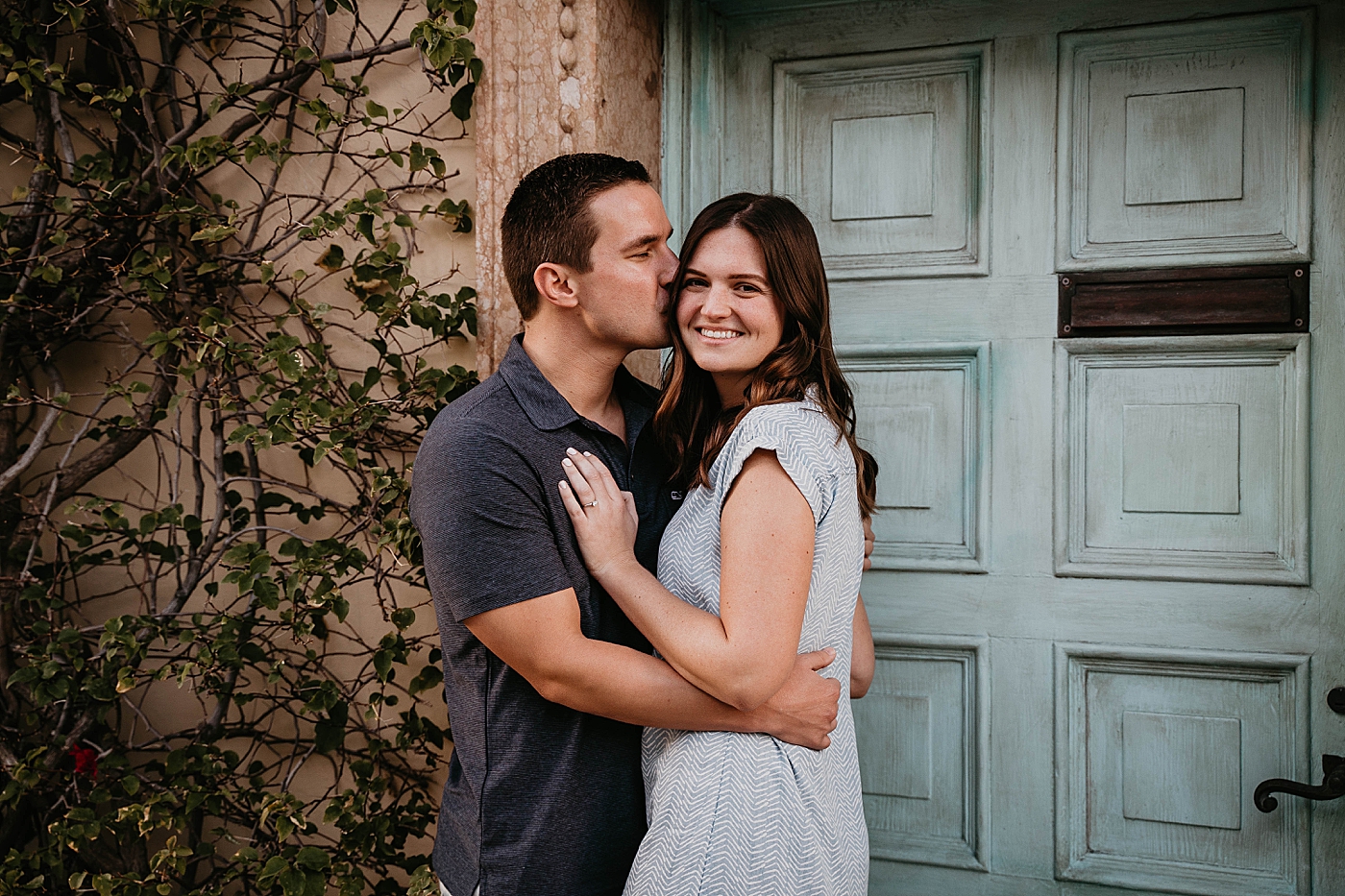 Man kissing lady on her cheeck Palm Beach Engagement Photography captured by South Florida Engagement Photographer Krystal Capone Photography