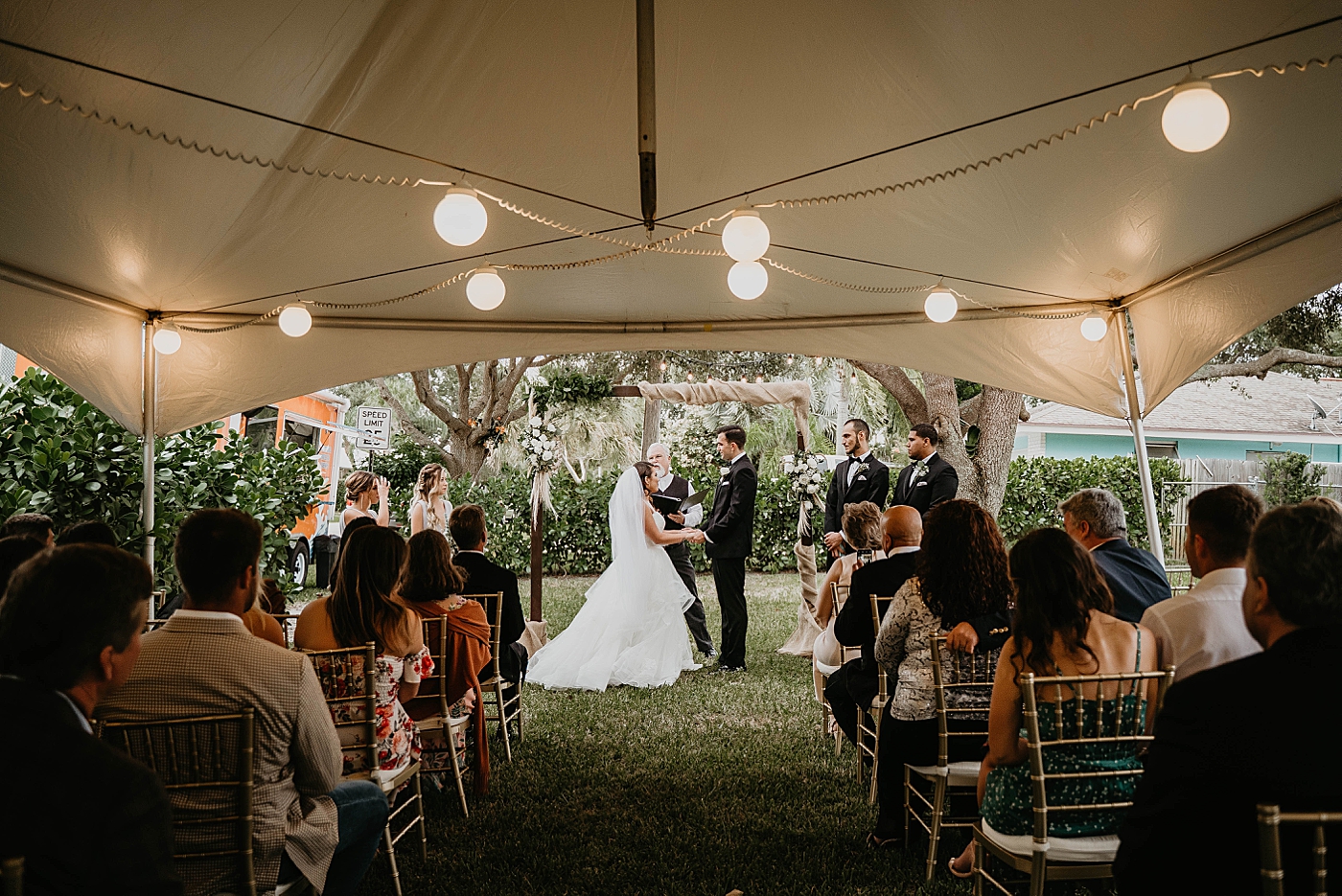 Bride and Groom holding hands and exchanging vows Intimate South Florida Wedding Photography captured by Wedding Photographer Krystal Capone Photography