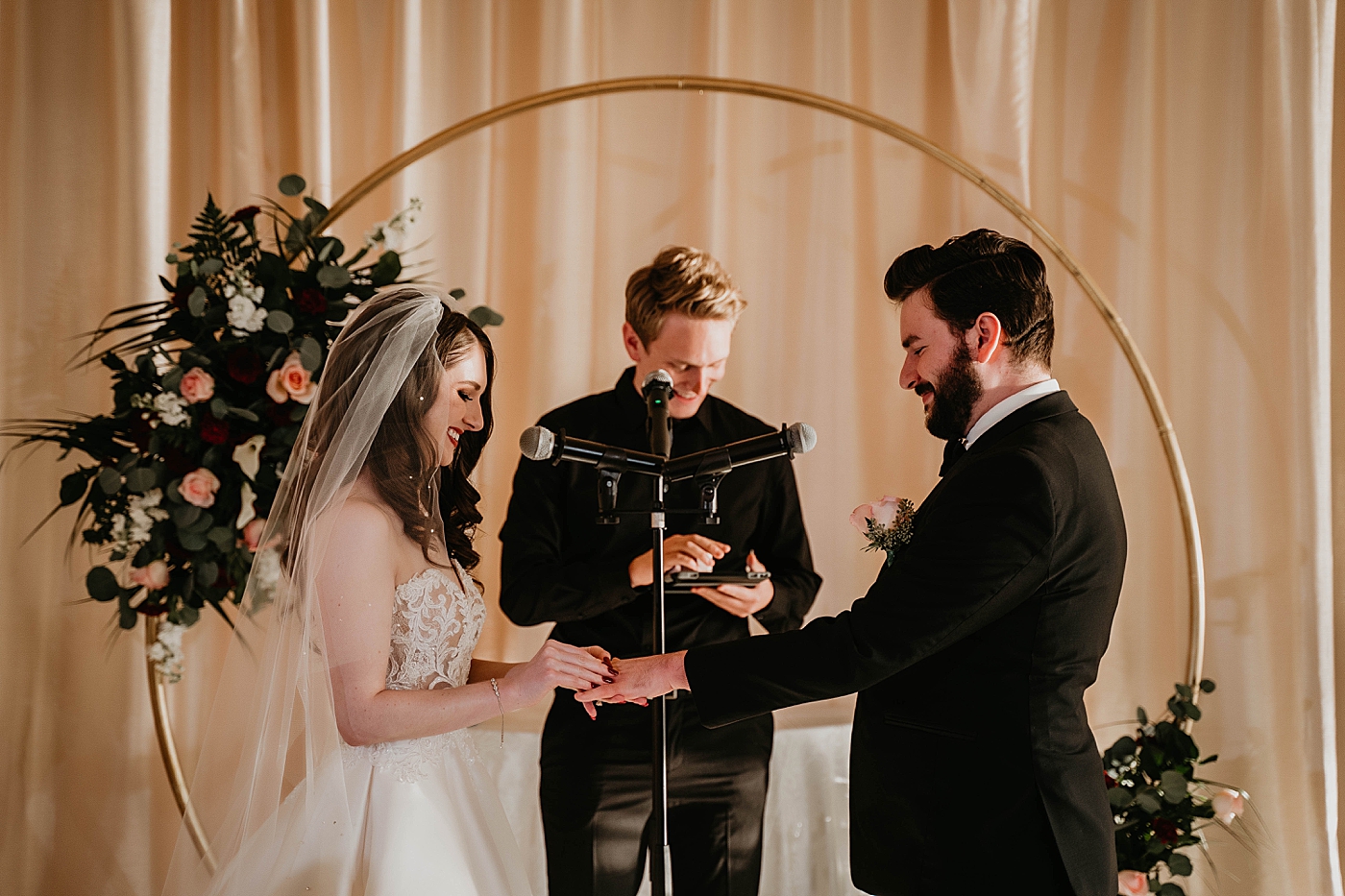 Bride putting ring on Groom Ceremony Breakers West Wedding Photography captured by South Florida Wedding Photographer Krystal Capone Photography 