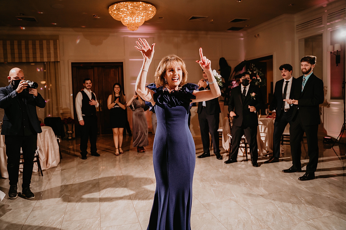 Dance circle Reception Breakers West Wedding Photography captured by South Florida Wedding Photographer Krystal Capone Photography 