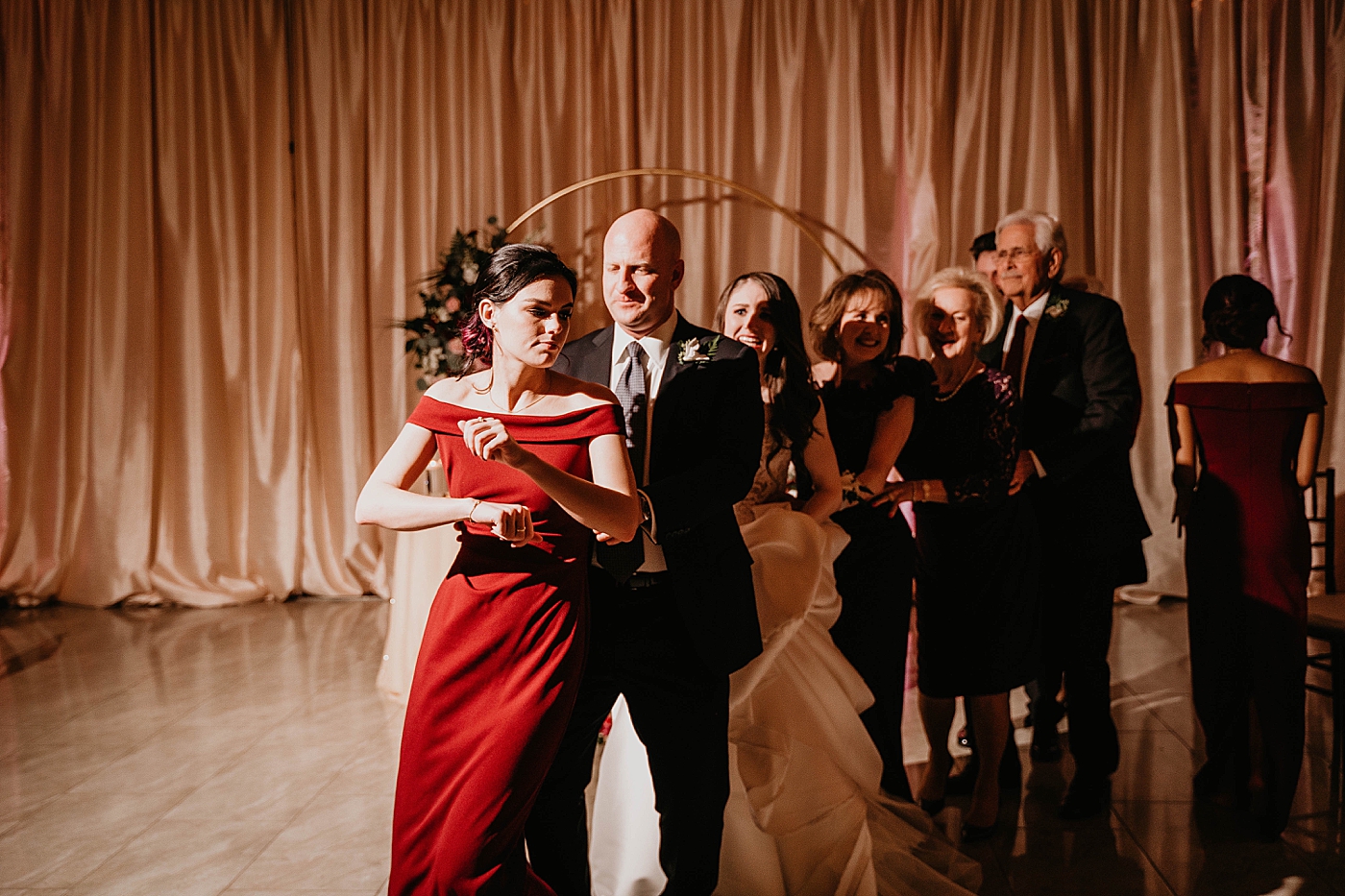 Conga line Reception Breakers West Wedding Photography captured by South Florida Wedding Photographer Krystal Capone Photography 