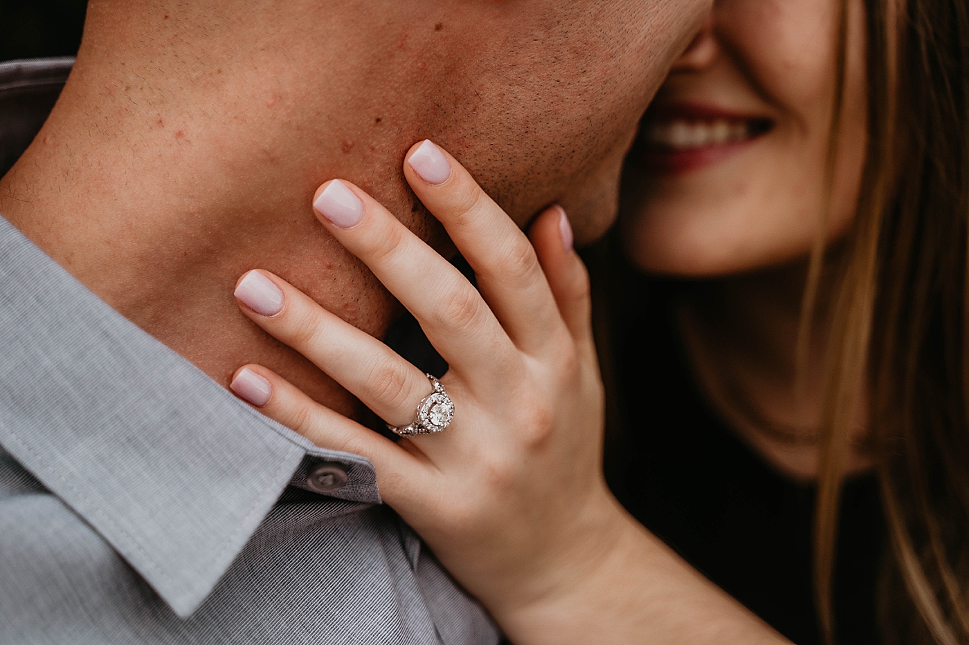 Closeup of engagement ring as couple hold each about to kiss Rustic South Florida Engagement Photography captured by South Florida Engagement Photographer Krystal Capone Photography 