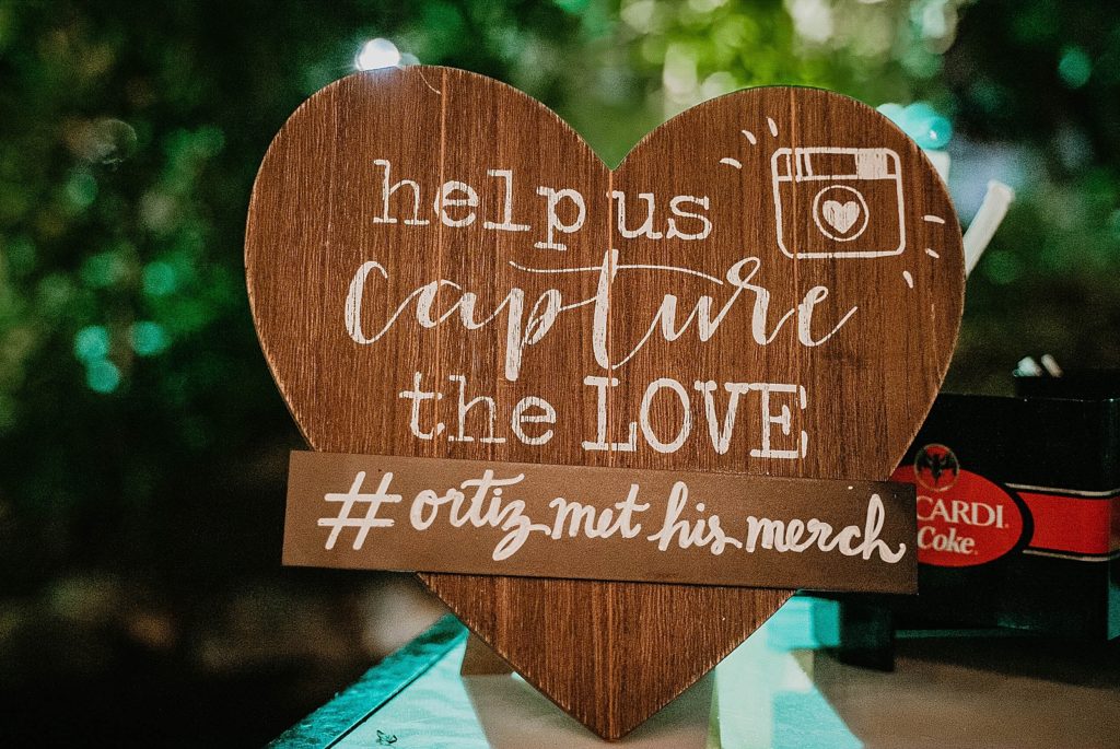 Ceremony detail shot of Instagram hashtag sign for picture taking 94th Aero Squadron Miami Wedding Photography captured by South Florida Engagement Photographer Krystal Capone Photography 