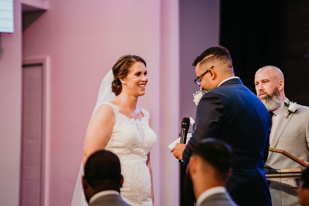 Groom giving vows during Ceremony 94th Aero Squadron Miami Wedding Photography captured by South Florida Engagement Photographer Krystal Capone Photography 