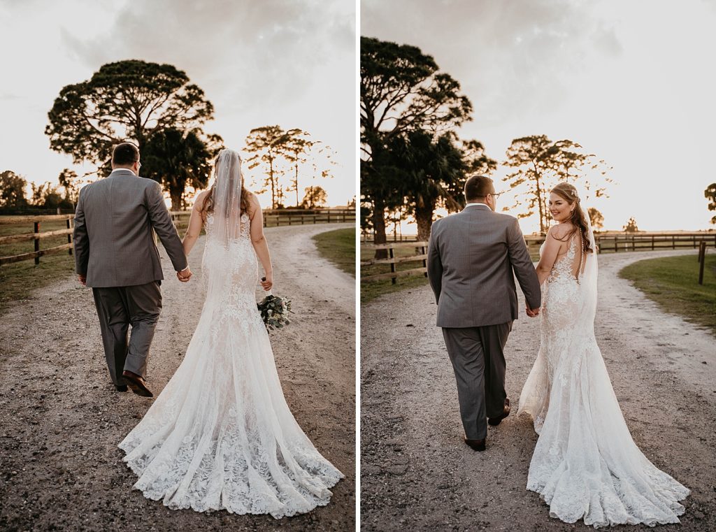 Bride and Groom walking together on dirt road with Bride looking behind her back Ever After Farms Wedding Photography captured by South Florida Wedding Photographer Krystal Capone Photography 