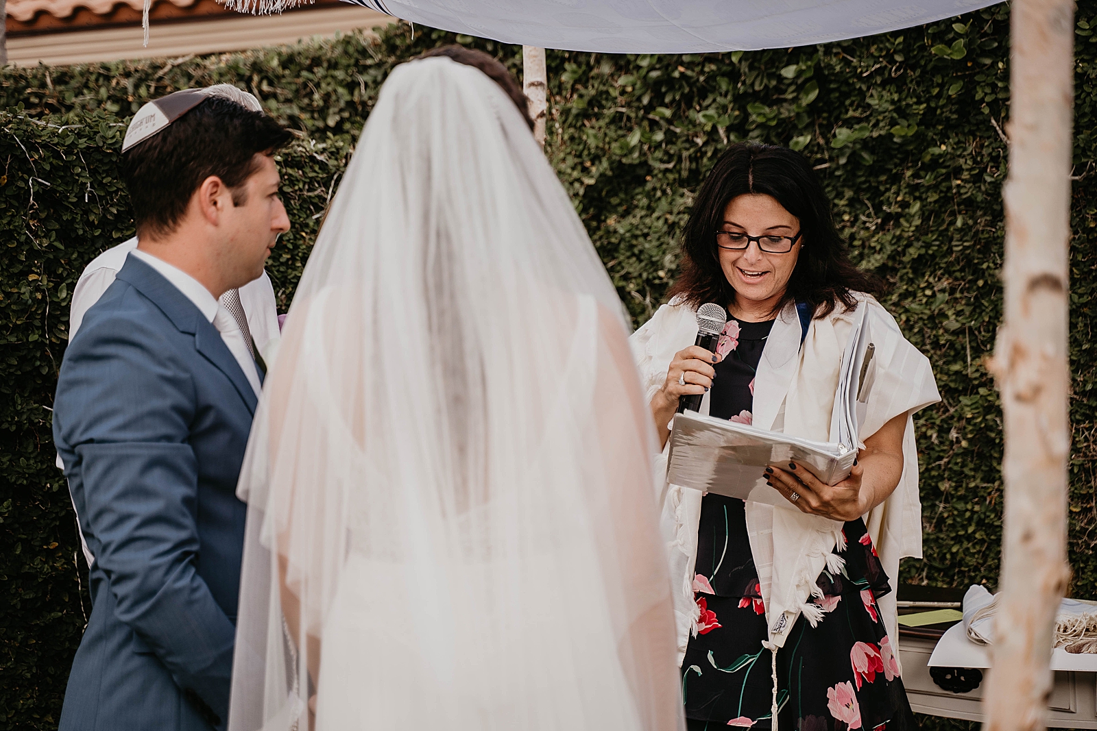 Bride and Groom listening to officiant Intimate South Florida Wedding Photography captured by South Florida Wedding Photographer Krystal Capone Photography 