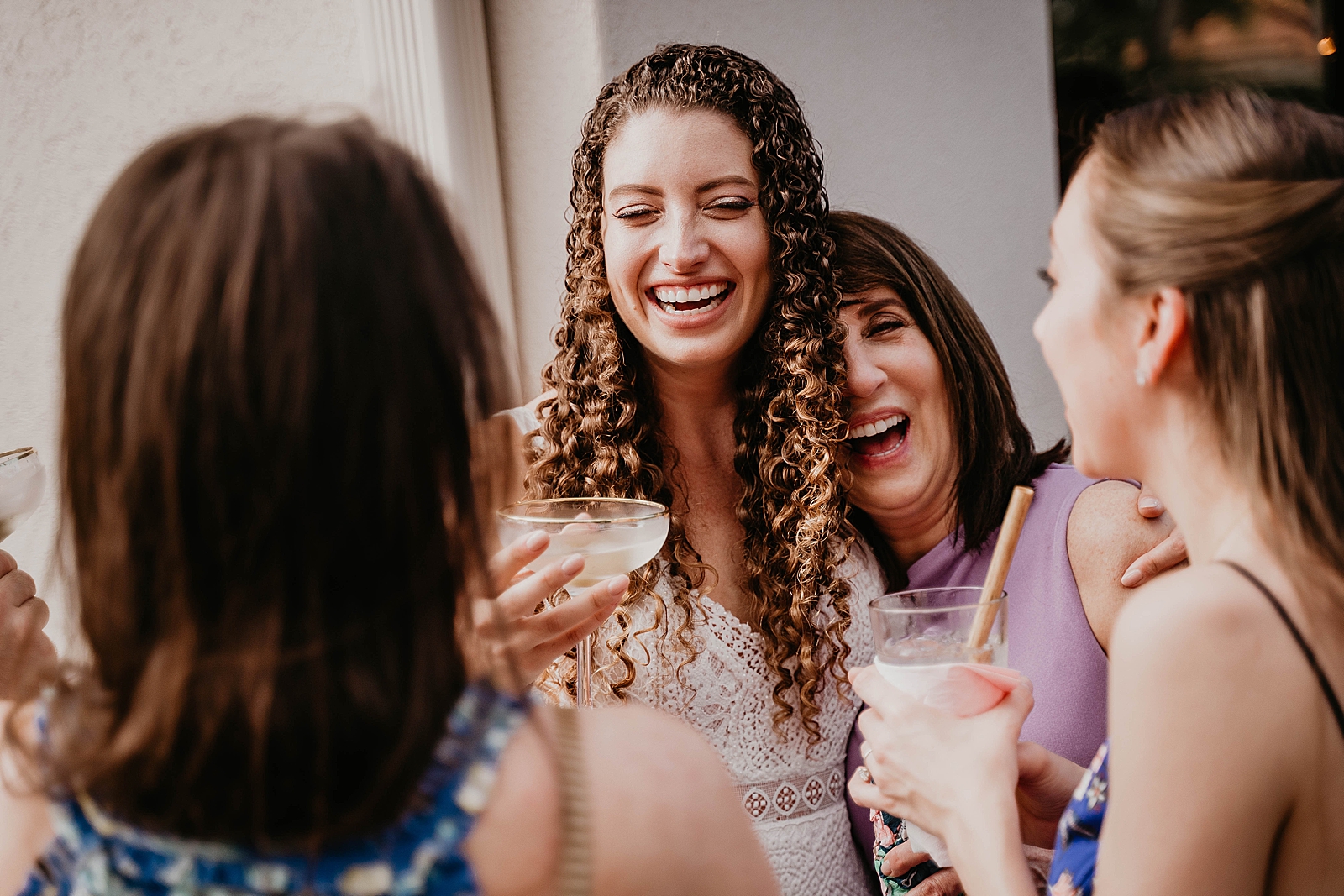 Bride having a drink with friends and family Intimate South Florida Wedding Photography captured by South Florida Wedding Photographer Krystal Capone Photography 