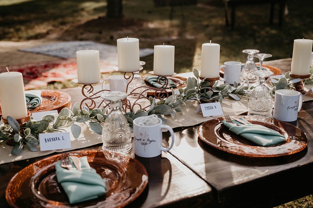 Reception detail shot of table with white candles and art deco wine glasses Intimate South Florida Wedding Photography captured by South Florida Wedding Photographer Krystal Capone Photography