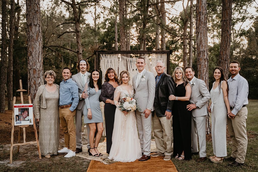 Bride and Groom with friends and family for post Ceremony portrait Intimate South Florida Wedding Photography captured by South Florida Wedding Photographer Krystal Capone Photography