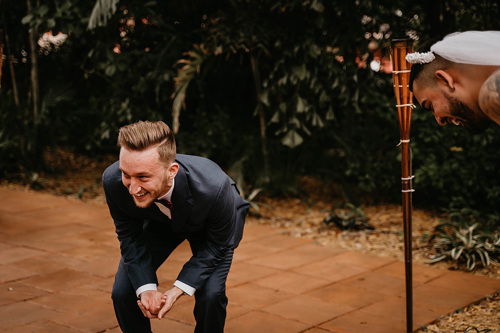 Groom's reaction to false Bride First Look Living Sculptures Sanctuary Wedding Photography captured by South Florida Wedding Photographer Krystal Capone Photography