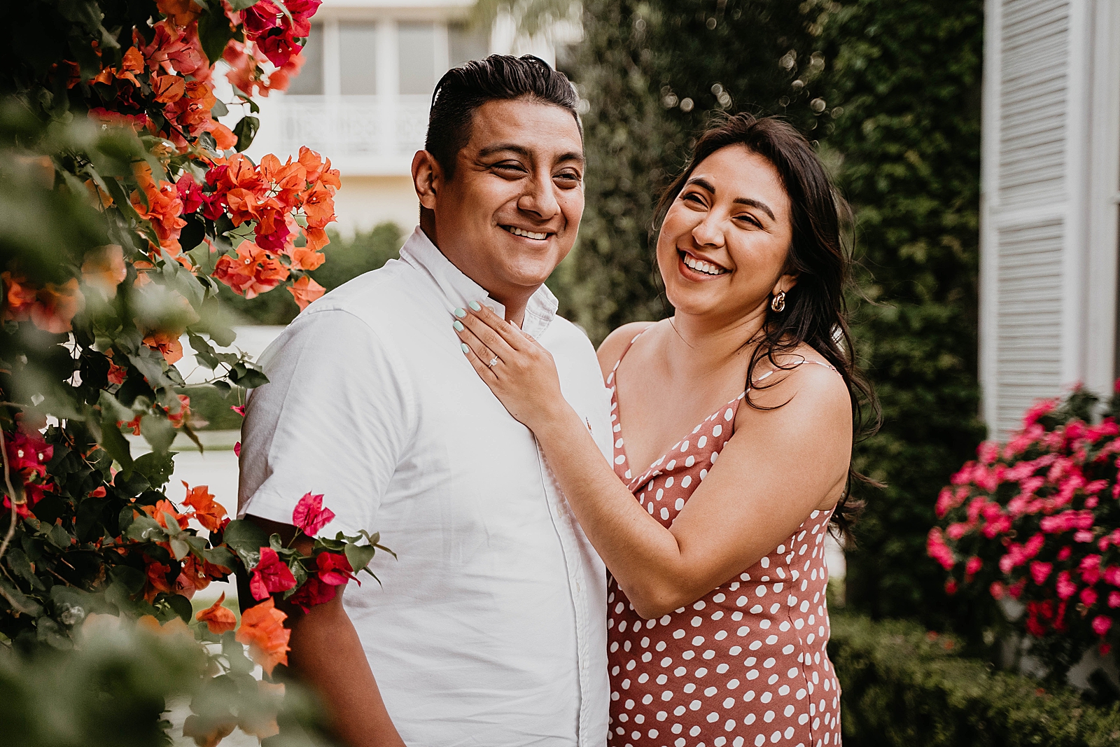 Couple holding each other smiling Palm Beach Island Engagement Photography captured by South Florida Engagement Photographer Krystal Capone Photography 