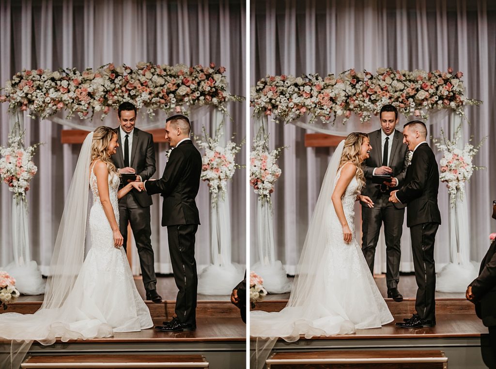 Groom putting ring on Bride and them laughing during Ceremony Pelican Club Wedding Photography captured by South Florida Wedding Photographer Krystal Capone Photography