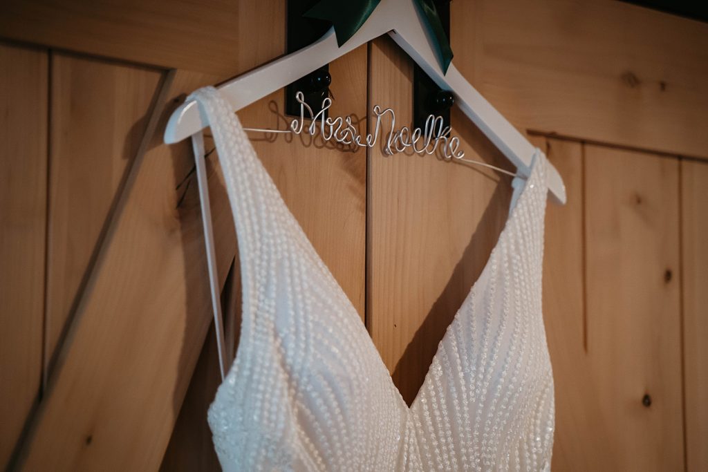 Detail shot of personalized coat hanger with Bride's name on it The Lake House Fort Pierce Wedding Photography captured by South Florida Wedding Photographer Krystal Capone Photography 