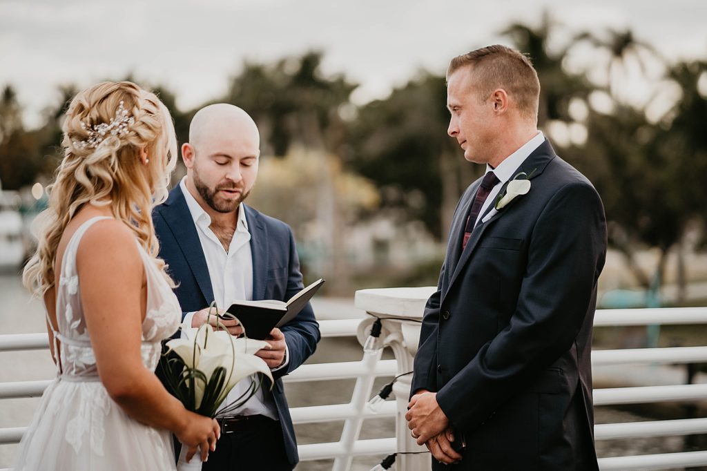 Closeup of Bride and Groom listening to Officiant for the Ceremony
