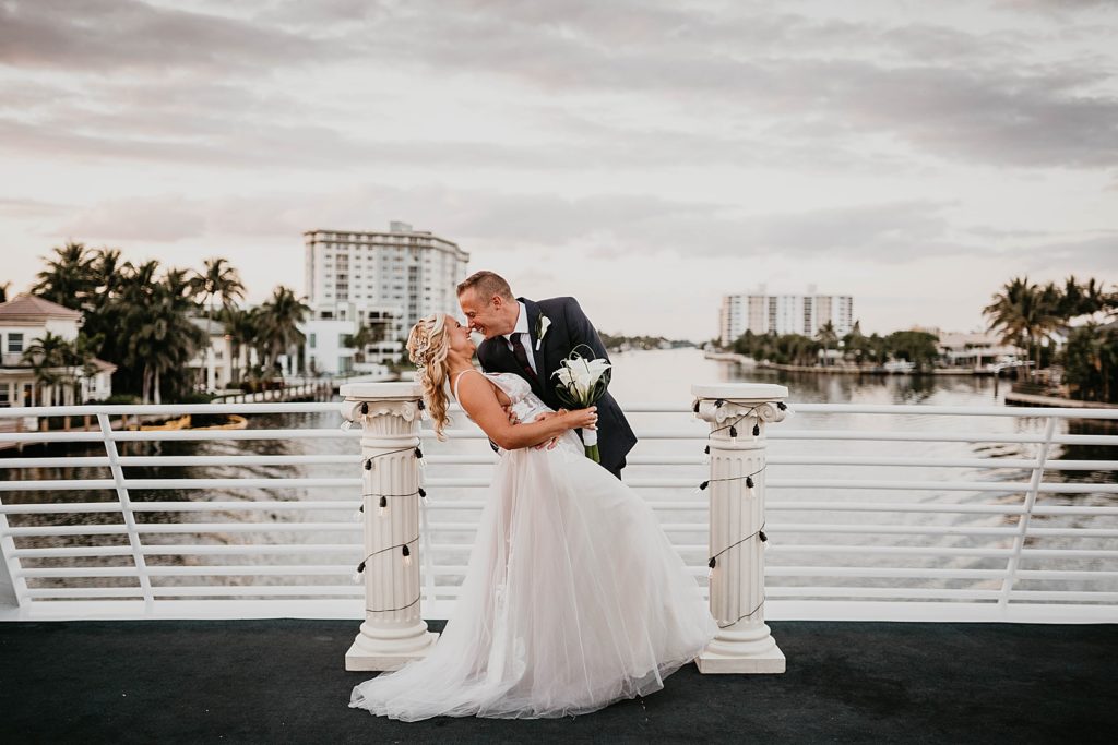 Bride and Groom dipping by the water