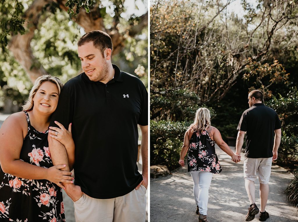 Couple holding hands walking on path
