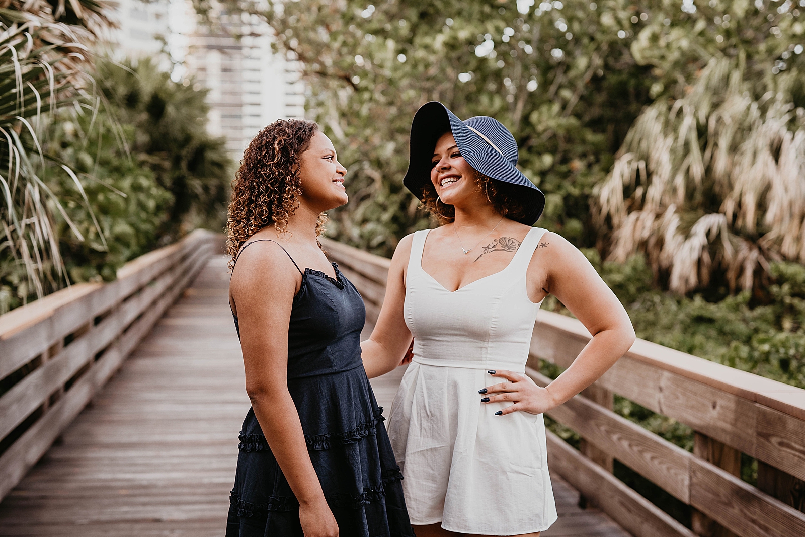 Sisters posing on the bridge together