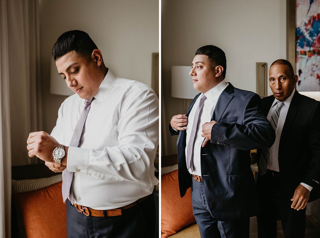 Groom getting watch and jacket on getting ready