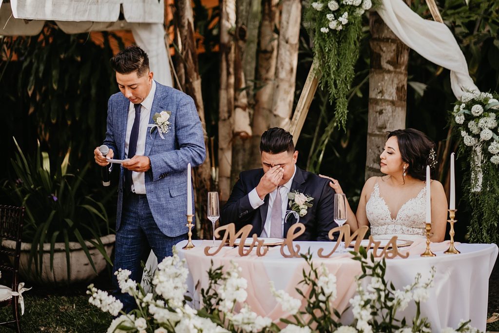 Groom crying during best man speech