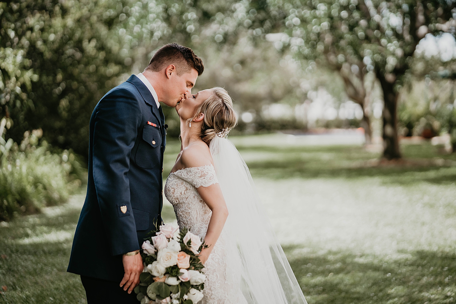 Bride and Groom kissing after first look