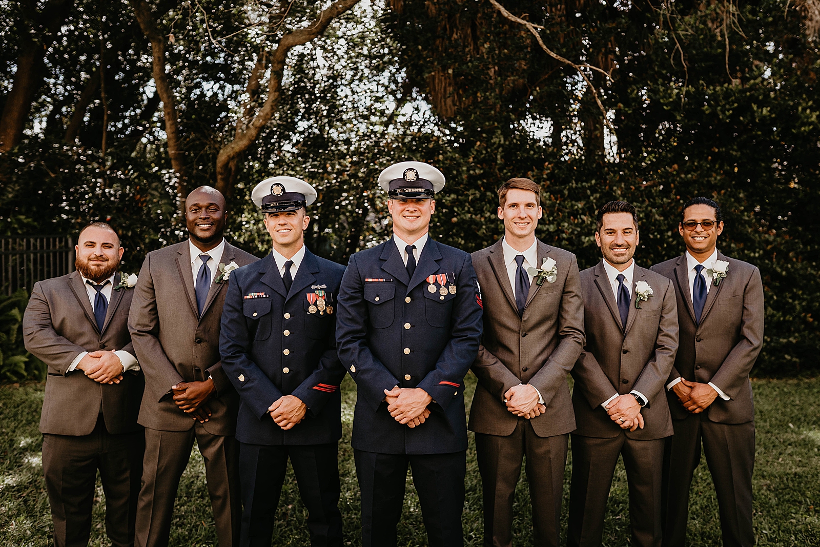 Groom and Groomsmen in formal pose portrait