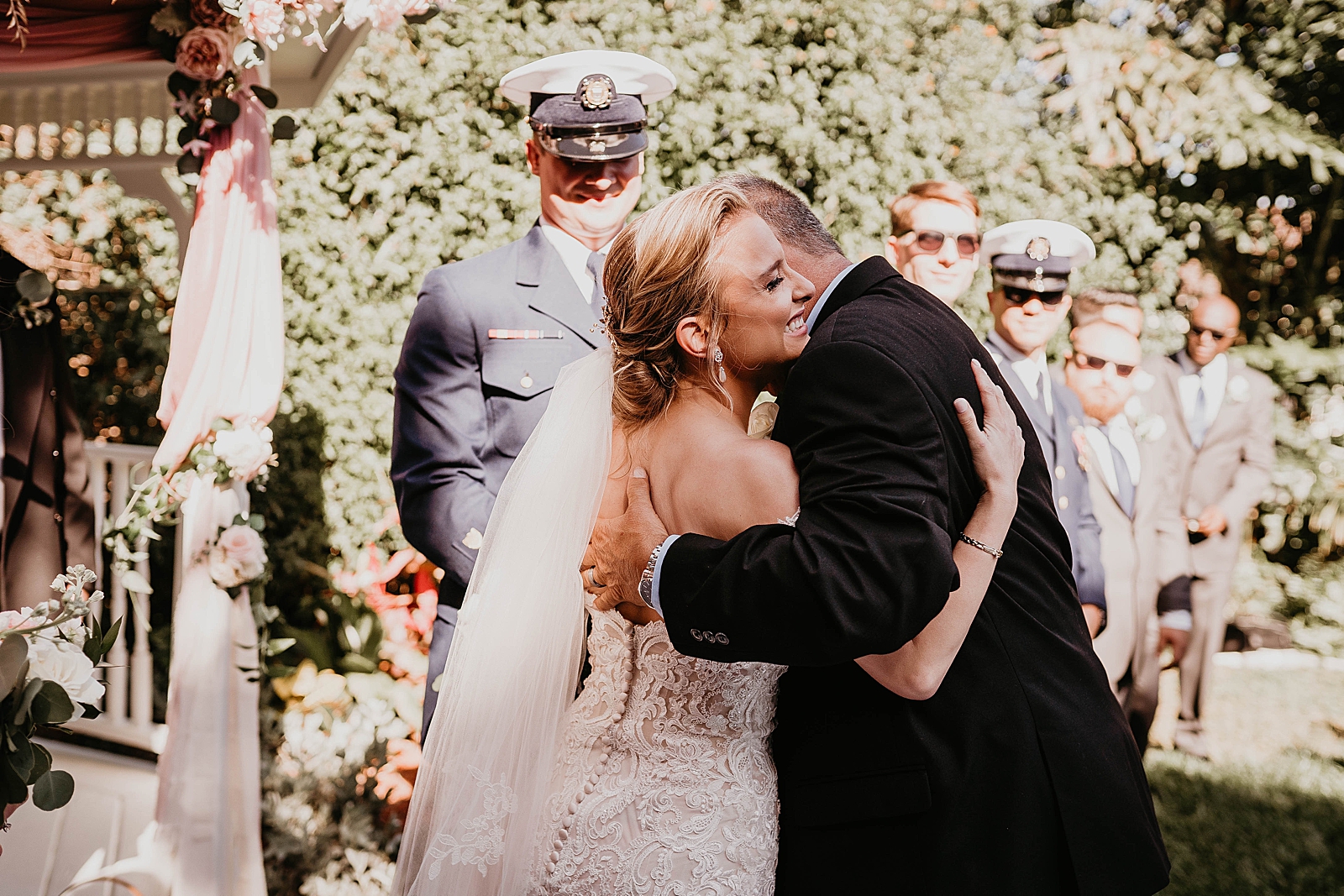 Bride and Father hugging after entering Ceremony