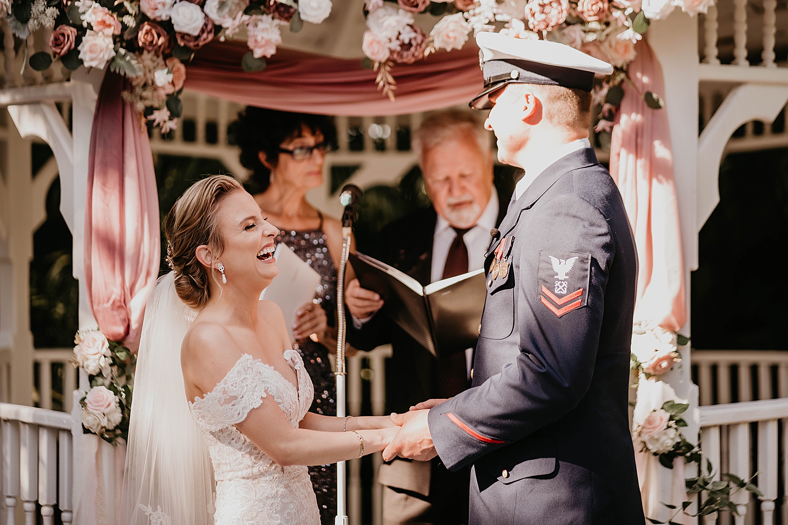 Bride and Groom laughing during Homily