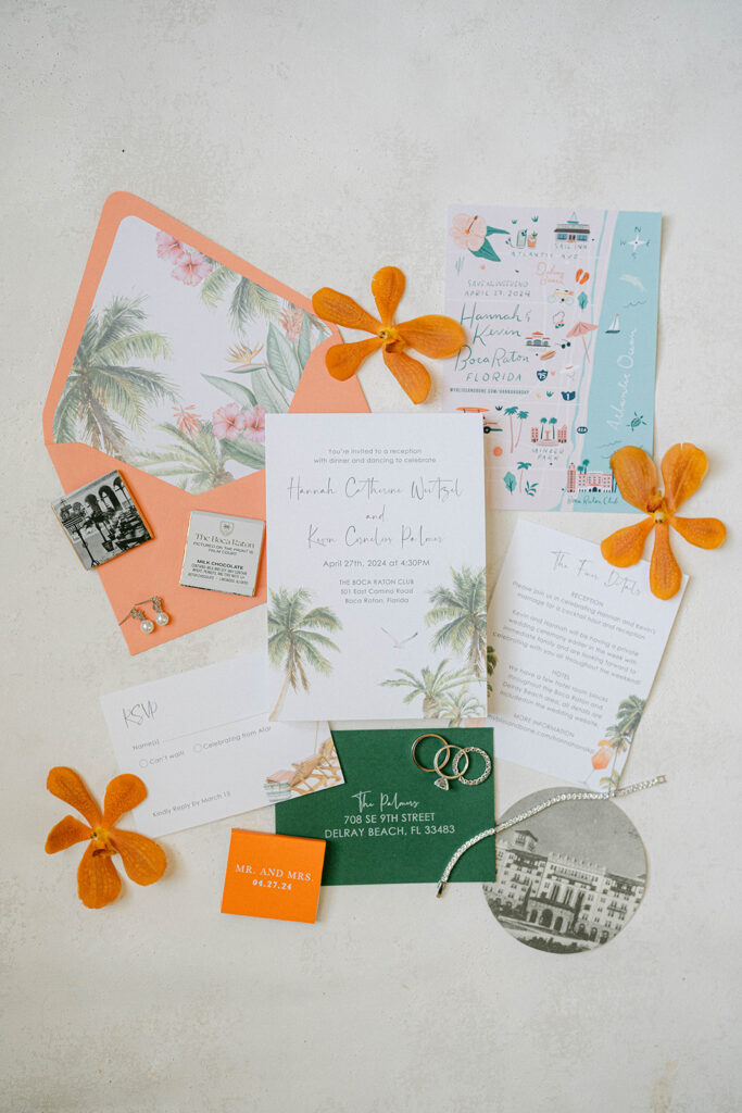 Wedding invitation suite with tropical palm frond design at The Boca Raton
