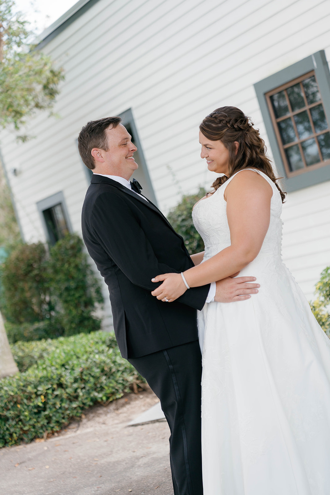 Couple first look embrace