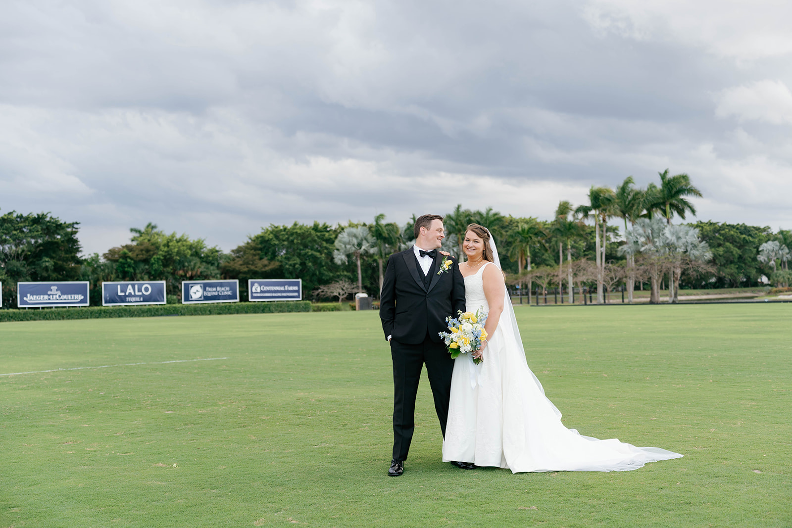 Couple portrait on polo field