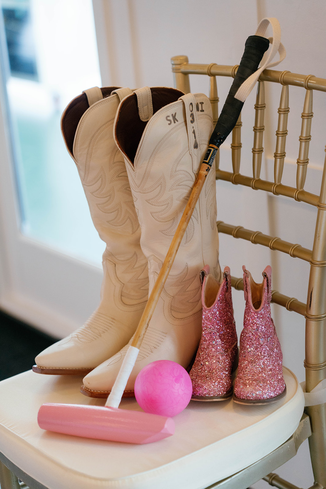 Bridal shoes and polo mallet
