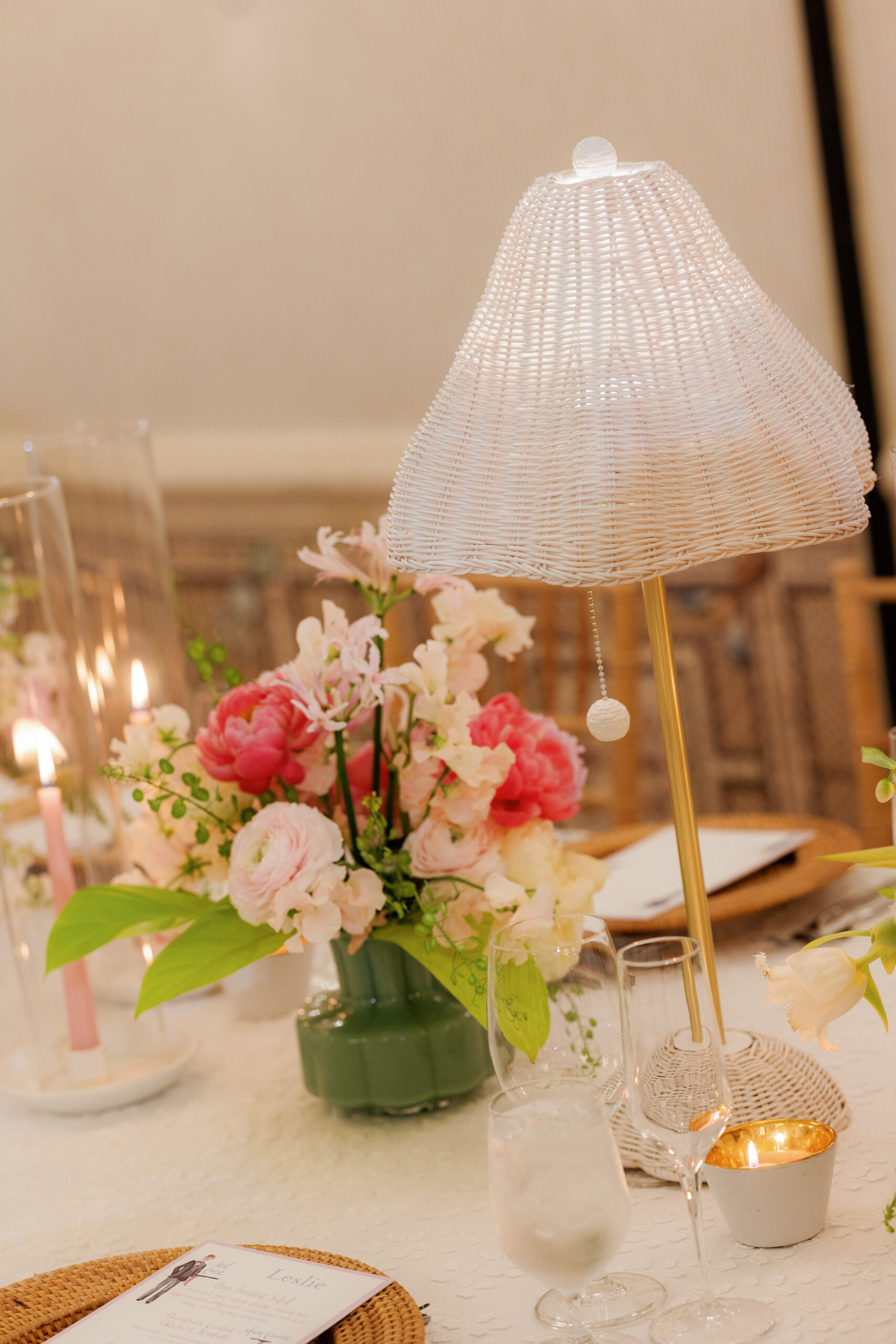 Harper and Luke wedding at The Colony Palm Beach - reception - A beautifully decorated reception table with a floral centerpiece, glasses, cand