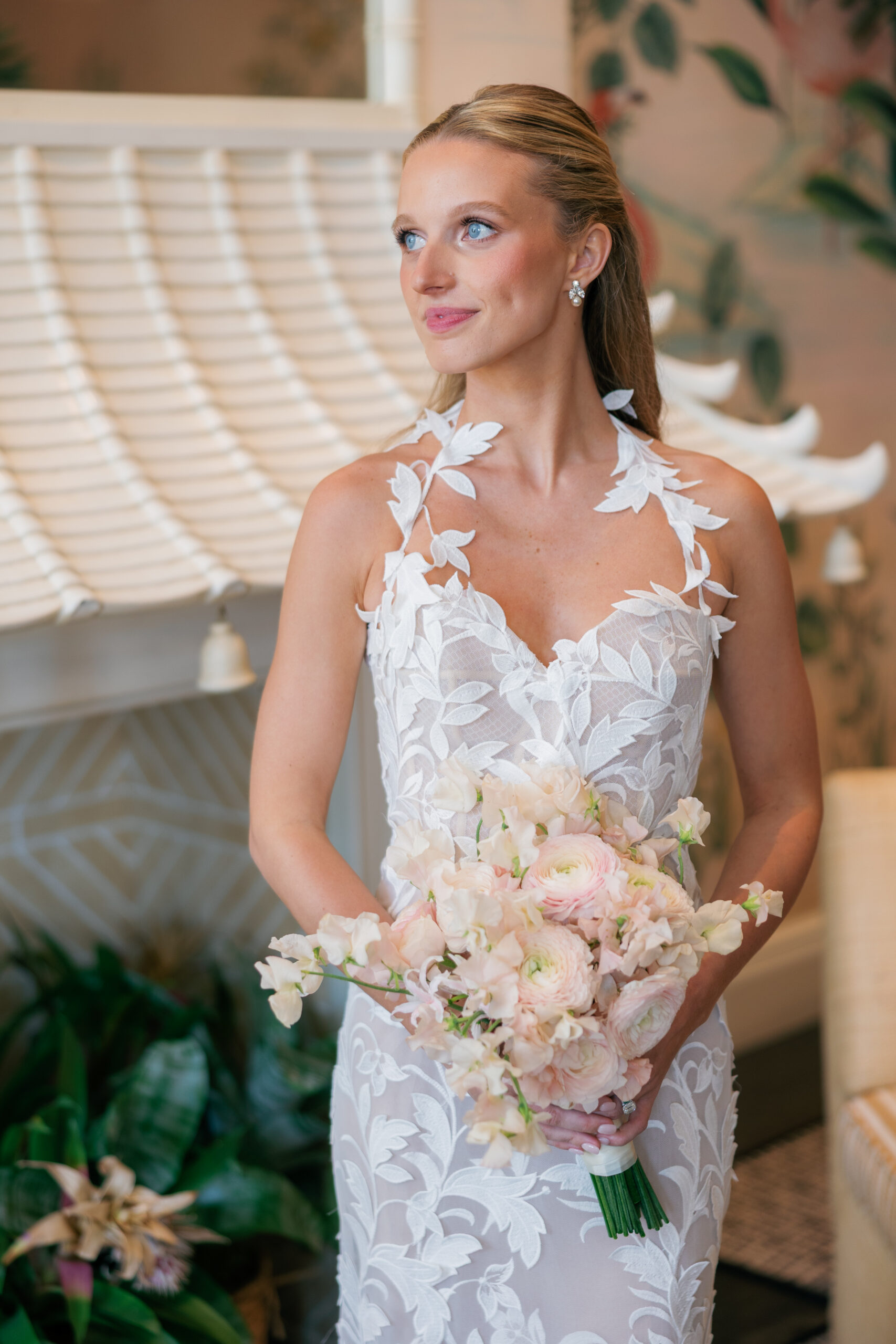 Harper and Luke wedding at The Colony Palm Beach - getting ready - A bride in a white lace dress holds a pink and white floral bouquet.