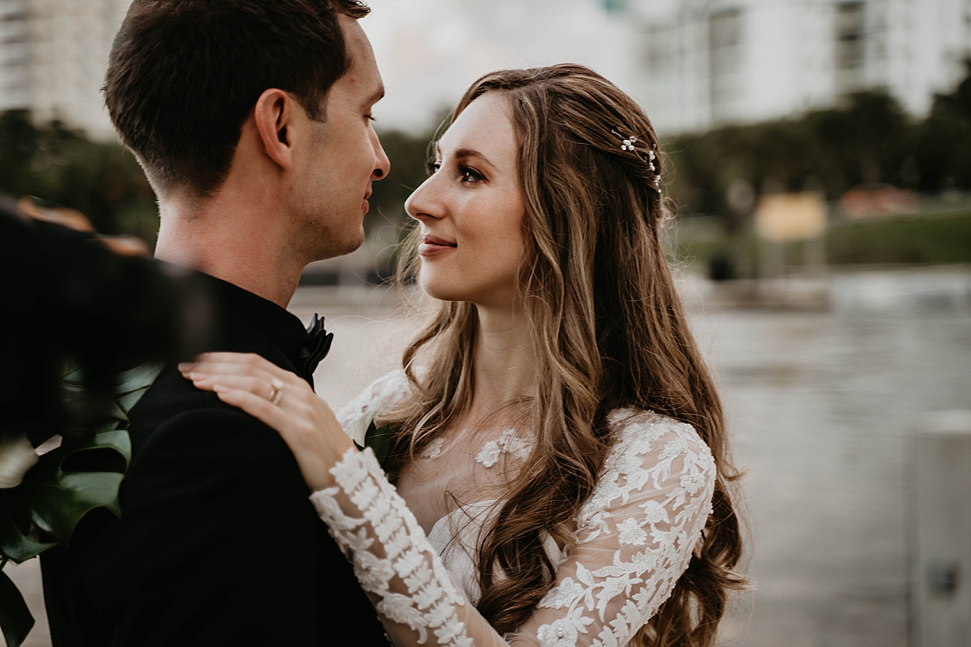 Bride and Groom looking into each other's eyes closeup Waterstone Resort and Marina Wedding captured by South Florida Wedding Photographer Krystal Capone Photography
