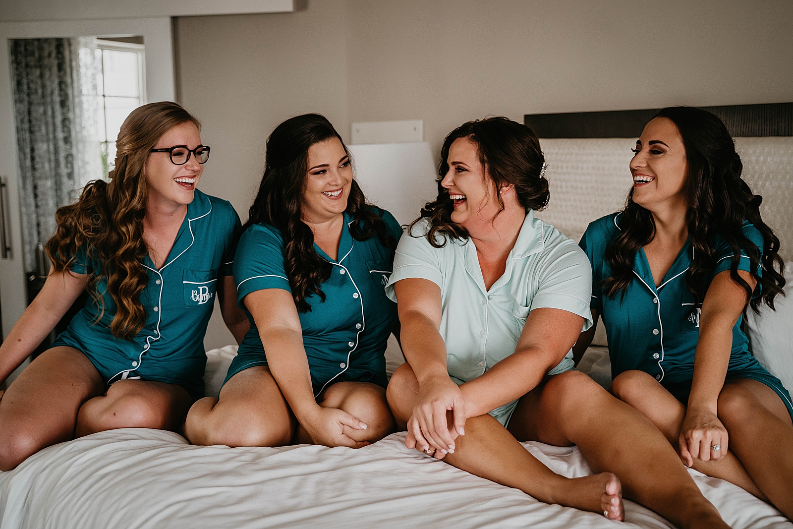 Bride getting ready shot with Bridesmaids Jupiter Lighthouse Wedding Photography captured by South Florida Wedding Photographer Krystal Capone Photography